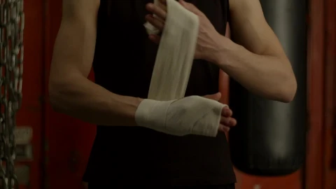 Stock Video Man Bandaging His Hand Before Boxing Animated Wallpaper - Free Live Wallpaper