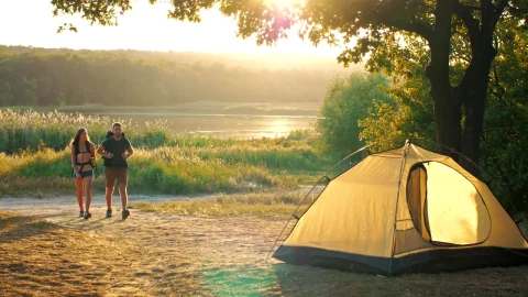 Stock Video Man And Woman Returning To Their Camp In Nature Animated Wallpaper - Free Live Wallpaper