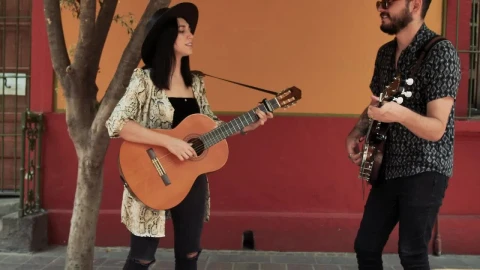 Stock Video Man And Woman Playing Music On The Street Asking For Animated Wallpaper - Free Live Wallpaper