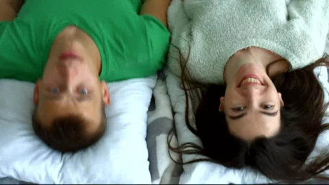 Stock Video Man And Woman Lying On A Bed Animated Wallpaper - Free Live Wallpaper