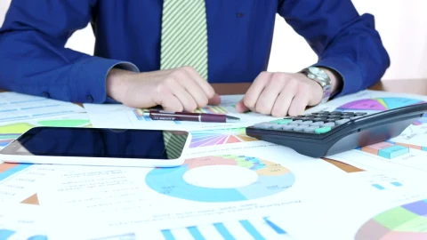 Stock Video Man Analyzing The Charts Animated Wallpaper - Free Live Wallpaper