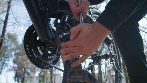 Stock Video Man Adjusting The Pedals Of His Bicycle Animated Wallpaper - Free Live Wallpaper