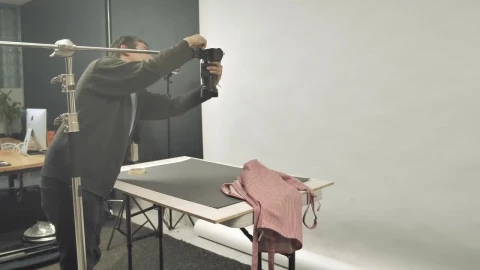 Stock Video Man Adjusting A Camera In The Studio Animated Wallpaper - Free Live Wallpaper