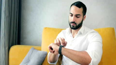 Stock Video Man Activates Futuristic Hologram Browser With Smart Watch Animated Wallpaper - Free Live Wallpaper