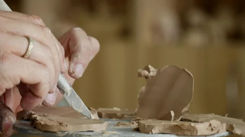 Stock Video Male Hands Working On Clay With Cutting Tools Animated Wallpaper - Free Live Wallpaper