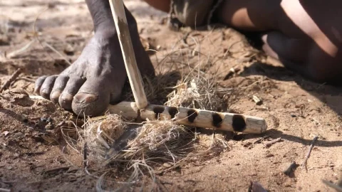 Stock Video Making Fire With Wooden Sticks On The Ground Animated Wallpaper - Free Live Wallpaper