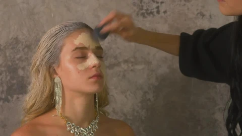 Stock Video Makeup Artist Applying Base To A Models Face Animated Wallpaper - Free Live Wallpaper