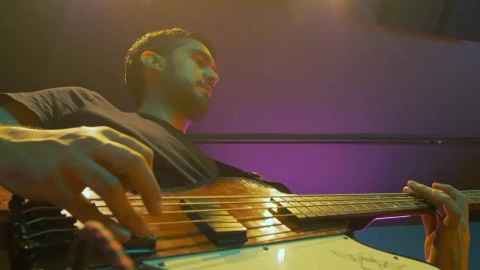 Stock Video Low View Of A Musician With His Electric Bass Animated Wallpaper - Free Live Wallpaper