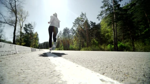 Stock Video Low Angle Of Runner Jogging On Forest Road Animated Wallpaper - Free Live Wallpaper
