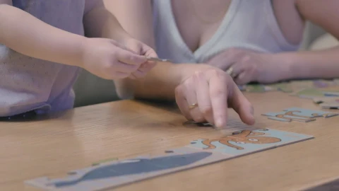 Stock Video Loving Mother Helps Her Daughter To Play Animated Wallpaper - Free Live Wallpaper