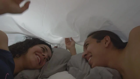 Stock Video Loving Couple Looking At Each Other Appreciatively In Bed Animated Wallpaper - Free Live Wallpaper