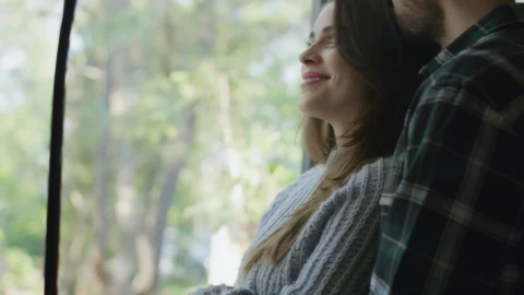 Stock Video Loving Couple Embracing In Front Of The Window Animated Wallpaper - Free Live Wallpaper