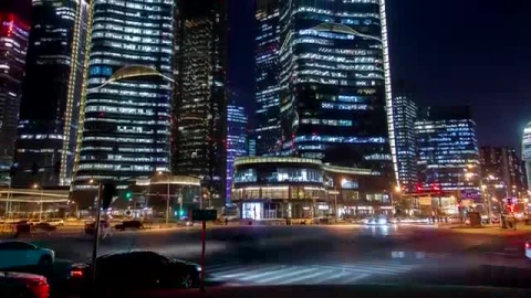 Stock Video Looking Up At Large Buildings In A City At Night Smal Animated Wallpaper - Free Live Wallpaper