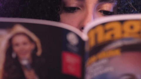 Stock Video Look Of A Girl While She Reads A Magazine Animated Wallpaper - Free Live Wallpaper