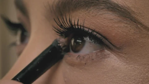 Stock Video Look Of A Girl While Putting Makeup On Her Eyelids Animated Wallpaper - Free Live Wallpaper