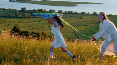 Stock Video Mother With Her Daughter Running On The Field With Animated Wallpaper - Free Live Wallpaper