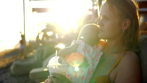 Stock Video Mother Enjoying A Break With Her Bab Animated Wallpaper - Free Live Wallpaper