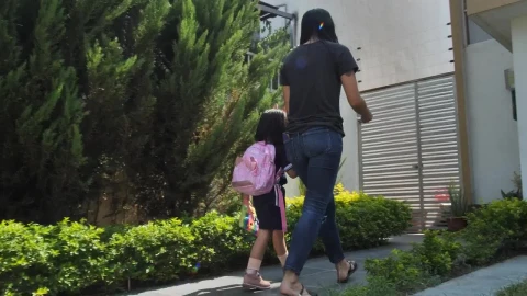 Stock Video Mother Coming Home After Picking Up Her Daughter From Schoo Animated Wallpaper - Free Live Wallpaper