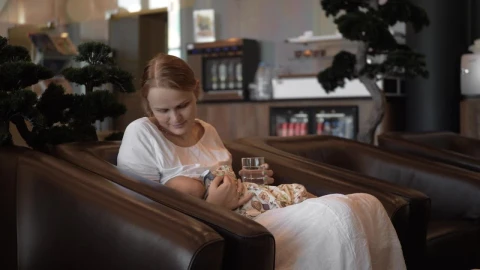 Stock Video Mother Breastfeeding Her Baby In A Hote Animated Wallpaper - Free Live Wallpaper