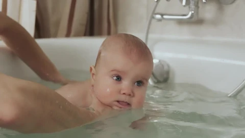 Stock Video Mother Bathing Her Baby In The Tu Animated Wallpaper - Free Live Wallpaper