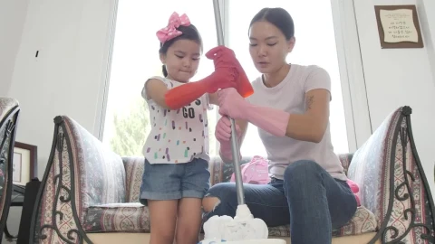Stock Video Mother And Daughter Squeezing A Mop Togethe Animated Wallpaper - Free Live Wallpaper