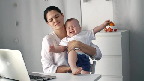 Stock Video Mom Tries To Work From Home Taking Care Of Animated Wallpaper - Free Live Wallpaper