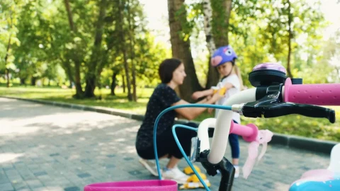 Stock Video Mom Puts Protective Equipment On Her Daughte Animated Wallpaper - Free Live Wallpaper