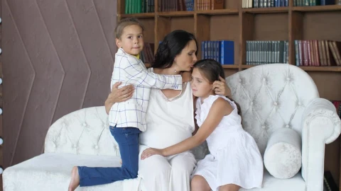 Stock Video Mom Hugs And Kisses Her Daughters Portrai Animated Wallpaper - Free Live Wallpaper