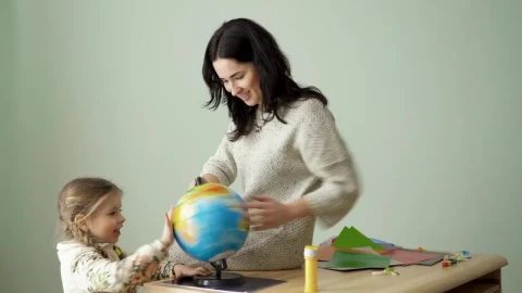 Stock Video Mom And Young Daughter Spin World Glob Animated Wallpaper - Free Live Wallpaper