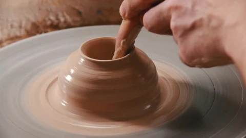 Stock Video Molding With Clay On The Spinning Whee Animated Wallpaper - Free Live Wallpaper