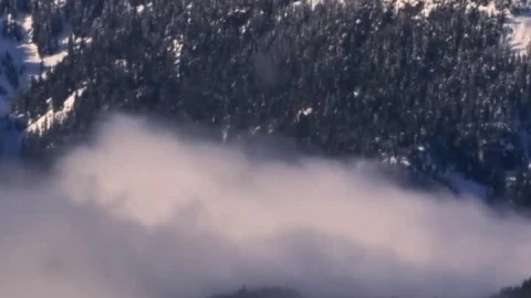 Stock Video Mist At The Base Of A Snowy Mountai Animated Wallpaper - Free Live Wallpaper