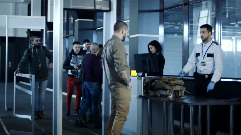 Stock Video Military Men Detain A Passenger At Airpor Animated Wallpaper - Free Live Wallpaper