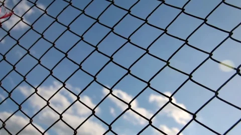 Stock Video Metal Mesh With Blue Sky In The Backgroun Animated Wallpaper - Free Live Wallpaper