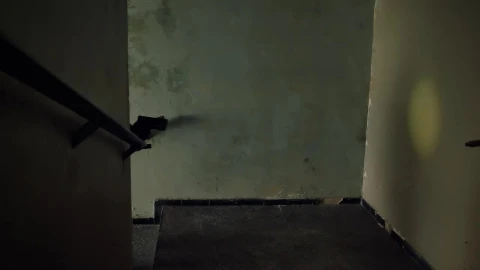Stock Video Mercenary Going Up The Stairs Aiming His Gu Animated Wallpaper - Free Live Wallpaper