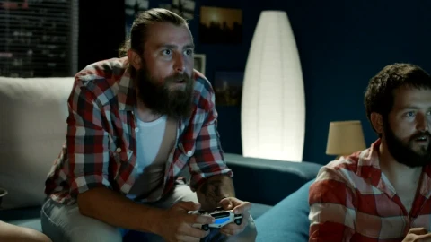 Stock Video Men Playing Video Games In The Living Roo Animated Wallpaper - Free Live Wallpaper