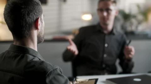 Stock Video Men In Black Shirts Shake Hands At Business Meetn Animated Wallpaper - Free Live Wallpaper