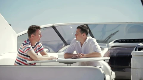 Stock Video Men Discuss Business Sale On Deck Of Yach Animated Wallpaper - Free Live Wallpaper