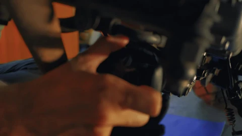 Stock Video Mechanic Maintaining A Motorcycle Engin Animated Wallpaper - Free Live Wallpaper
