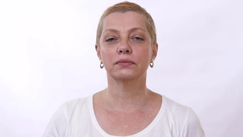 Stock Video Mature Woman Checks For Wrinkles And Massages Fac Animated Wallpaper - Free Live Wallpaper