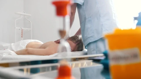 Stock Video Massaging Womans Back In The Medical Offic Animated Wallpaper - Free Live Wallpaper