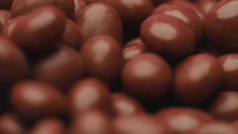 Stock Video Many Chocolate Beans Slowly Rotatin Animated Wallpaper - Free Live Wallpaper