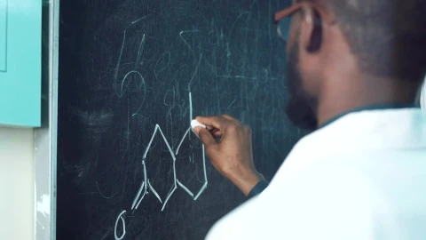 Stock Video Man Writing A Chemical Formula On The Blackboar Animated Wallpaper - Free Live Wallpaper