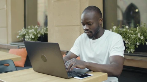Stock Video Man Working Remotely From A Coffee Sho Animated Wallpaper - Free Live Wallpaper