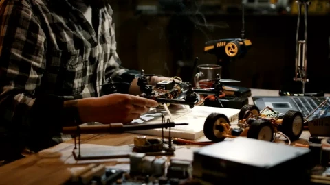 Stock Video Man Working On Repairing Drone Circuit Animated Wallpaper - Free Live Wallpaper