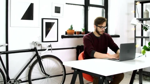Stock Video Man Working On His Laptop On A Startup Environmen Animated Wallpaper - Free Live Wallpaper