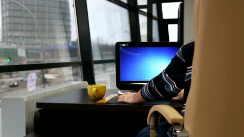 Stock Video Man Working On His Computer By The Windo Animated Wallpaper - Free Live Wallpaper
