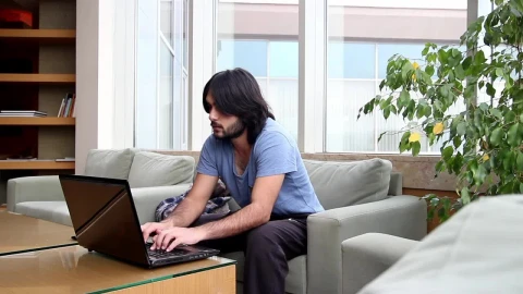 Stock Video Man Working On A Computer In A Roo Animated Wallpaper - Free Live Wallpaper