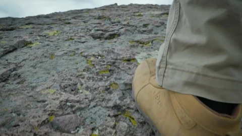 Stock Video Man With Yellow Boots Walking On A Ston Animated Wallpaper - Free Live Wallpaper