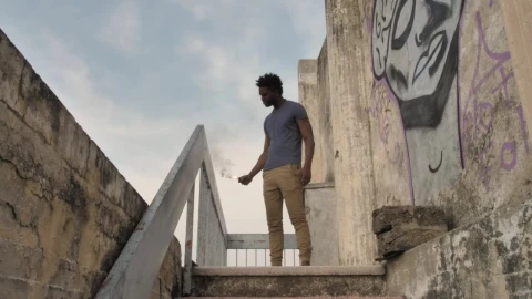 Stock Video Man With Smoke Bomb On Staircas Animated Wallpaper - Free Live Wallpaper