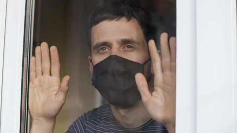Stock Video Man With Mask Looks Longingly From His Windo Animated Wallpaper - Free Live Wallpaper